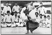 Jigoro Kano performing uki goshi