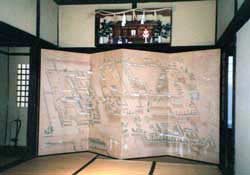 An old screen depicts a castle town (possibly Matsue) in the Buke Yashiki (“Old Samurai House”).